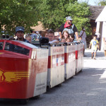 Riders on the M&M Railroad trackless train